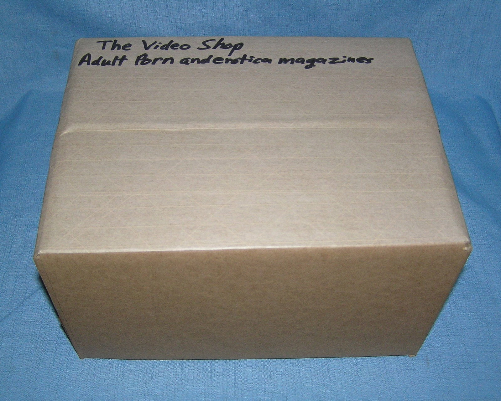 Moving and Storage Company mystery box lot marked The Video Shop: Moving and Storage Company mystery box lot marked The Video Shop: Adult Porn and Erotica Magazines part of a moving and storage company seized or unclaimed merchandise group sent to auction for liquid