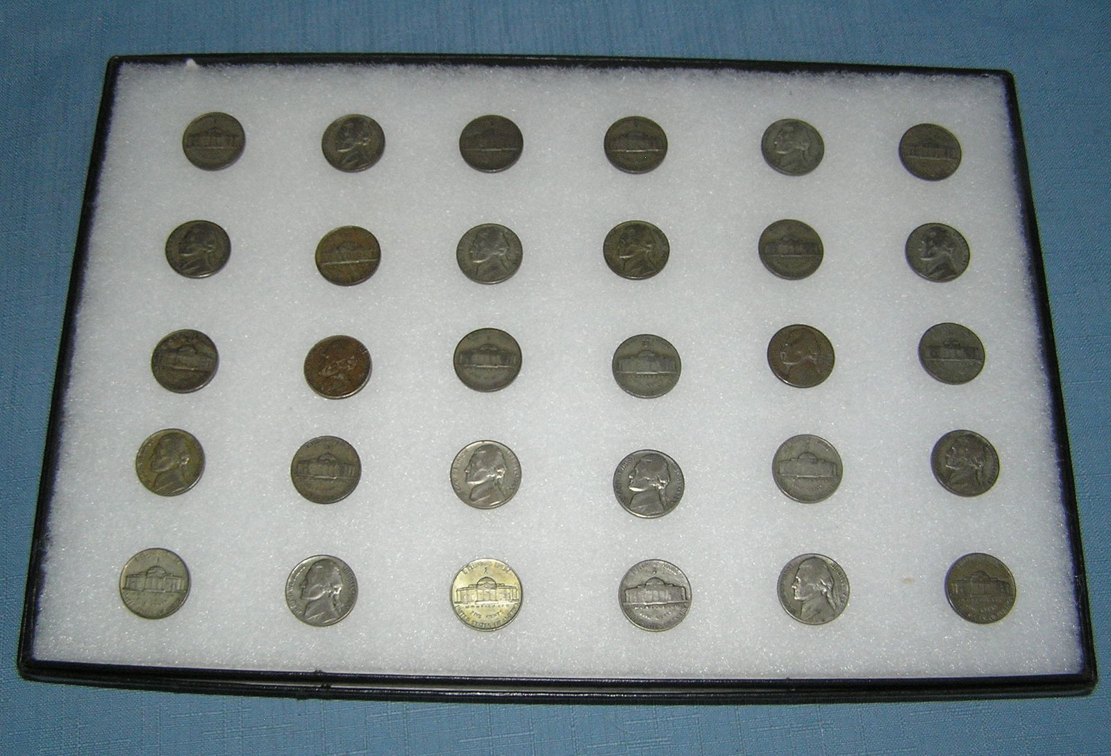 Collection of US silver war time Jefferson nickles: Collection of US silver war time Jefferson nickles all circa WWII with P, D and S mints includes 5 ounces of US silver est. value $125.00-$150.00