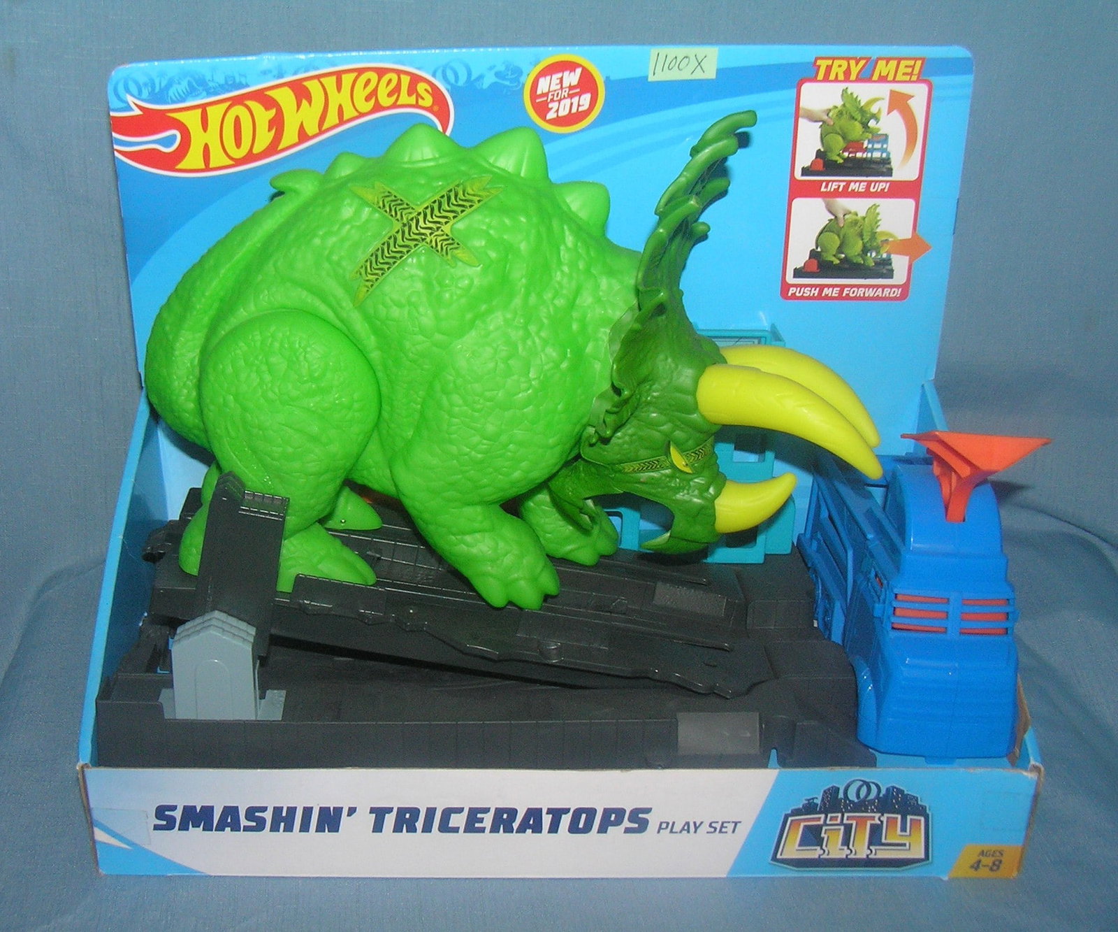 Hot Wheels smashing triceratops play set: Hot Wheels smashing triceratops action adventure play set mint on card est. value $40.00-$45.00