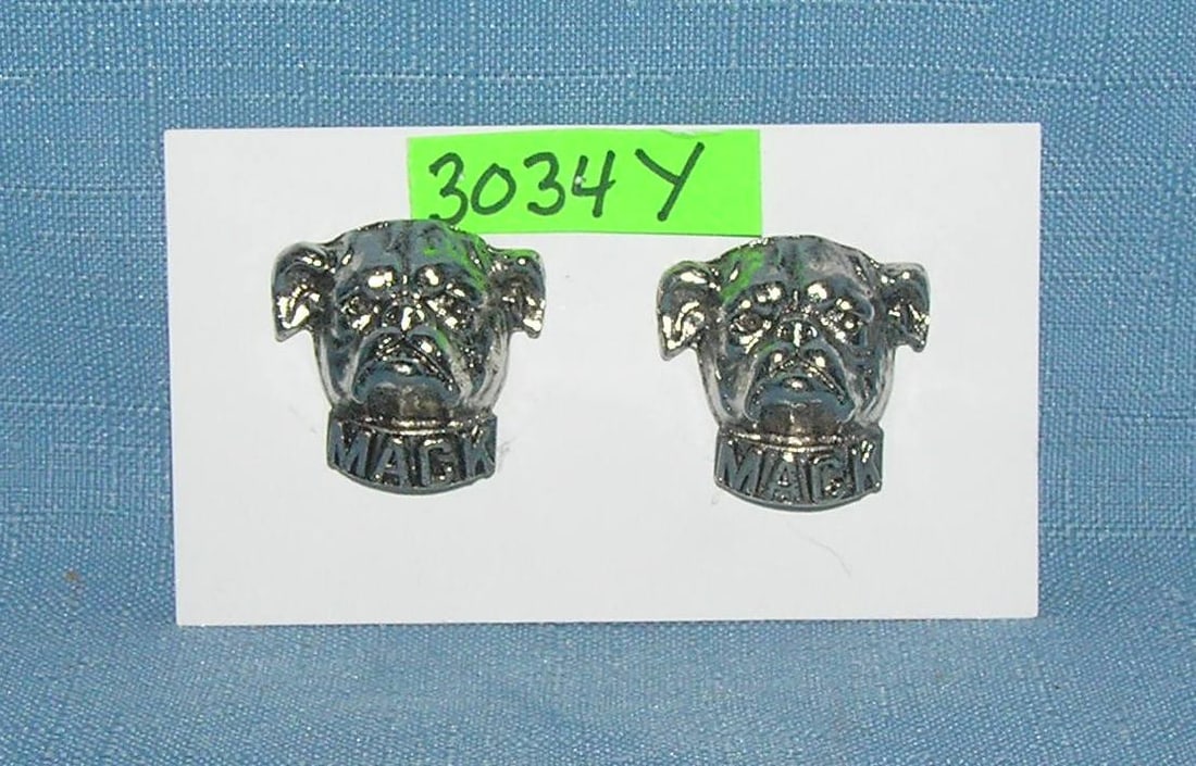 Pair of bull dog Mack Truck pins: Pair of bull dog Mack Truck pins est. value $75.00-$100.00