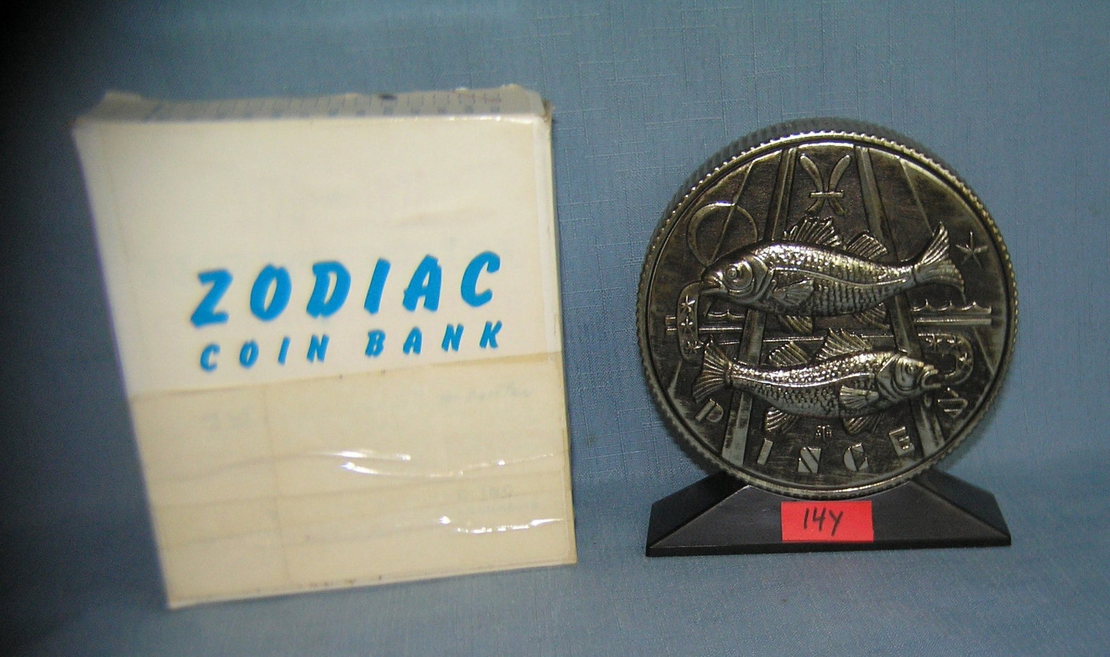 Pisces all cast metal Zodiac bank with original box: Pisces all cast metal Zodiac bank with original box est. value $75.00-$80.00