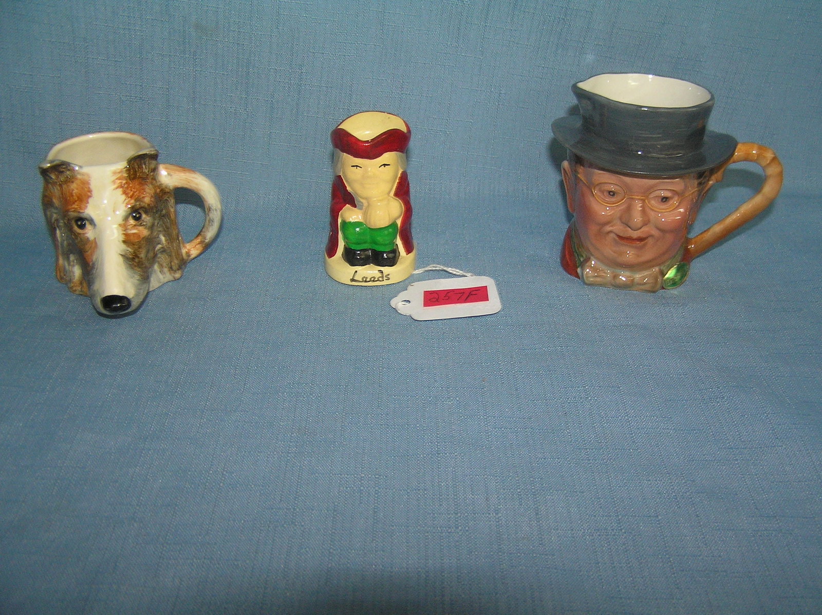 Group of vintage hand painted toby mugs: Group of vintage hand painted toby mugs includes Pickwick by Dickens, dog figurine by L and S hand painted in Englandand 1 marked Leeds est. value $100.00--$125.00