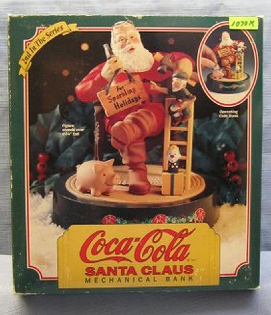 Coca Cola Santa Claus mechanical bank: Vintage Coca Cola mechanical Santa Claus mechanical bank with original box second in the series $150.00-$175.00