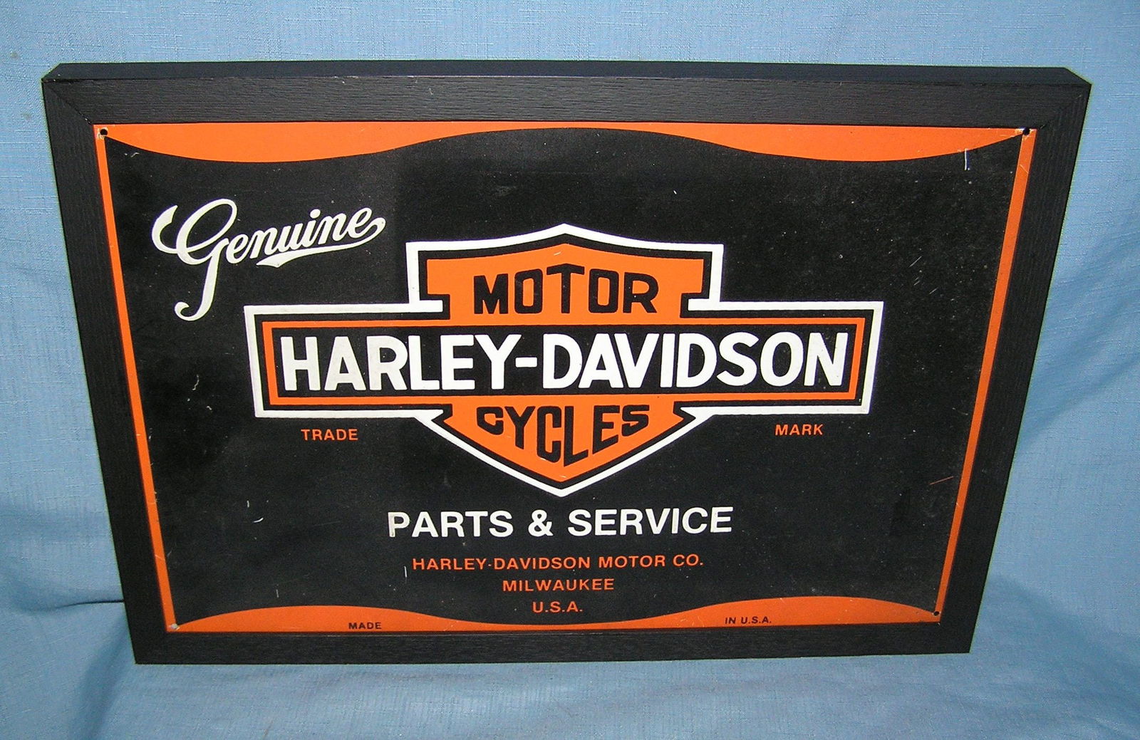 Harley Davidson framed metal advertising sign: Harley Davidson framed metal advertising sign 12 inches by 18 inches est. value $175.00-$200.00