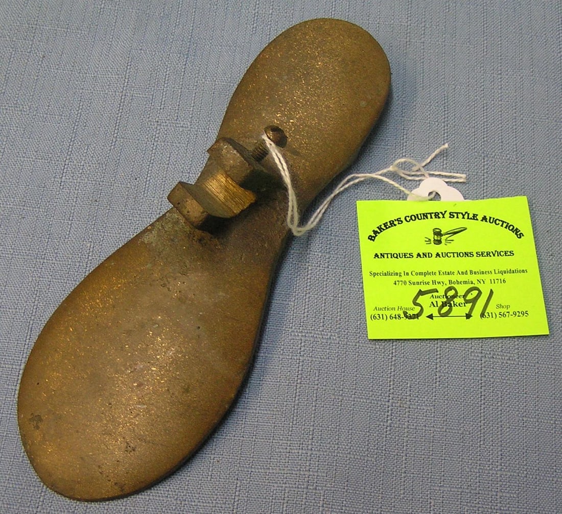Solid brass cobblers shoe rest: Solid brass cobblers shoe rest est. value $25.00-$30.00