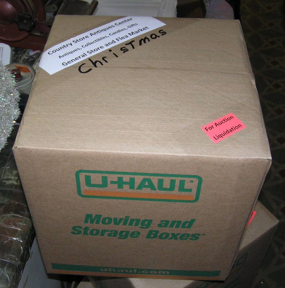 Moving and Storage Company mystery box lot: Moving and Storage Company mystery box lot marked Christmas, Country Store Antiques Center: Antiques, Collectibles, Candies, Gifts, General Store and Flea Market part of a moving and storage company s