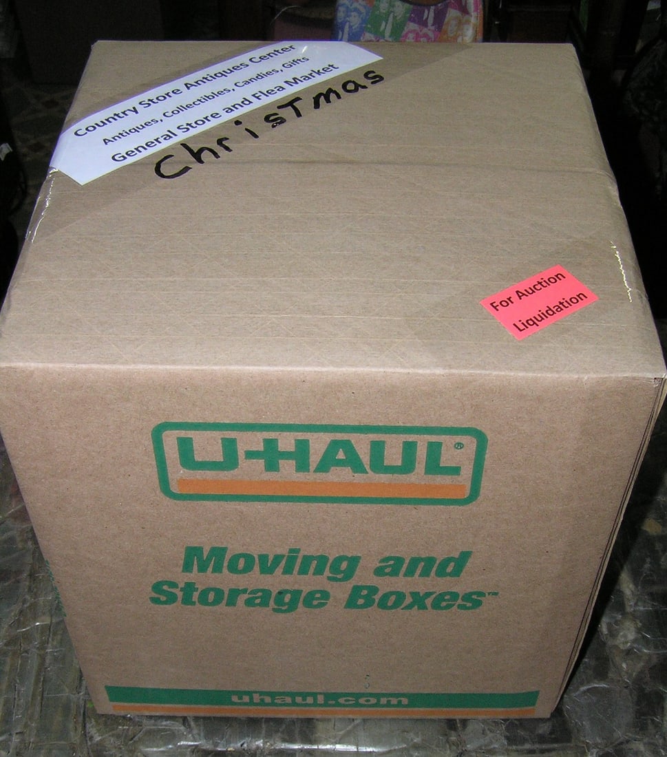 Moving and Storage Company mystery box lot: Moving and Storage Company mystery box lot marked Christmas, Country Store Antiques Center: Antiques, Collectibles, Candies, Gifts, General Store and Flea Market part of a moving and storage company s
