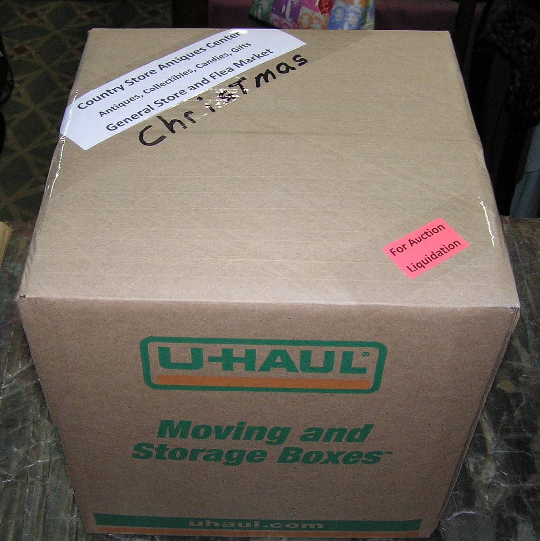 Moving and Storage Company mystery box lot: Moving and Storage Company mystery box lot marked Christmas, Country Store Antiques Center: Antiques, Collectibles, Candies, Gifts, General Store and Flea Market part of a moving and storage company s