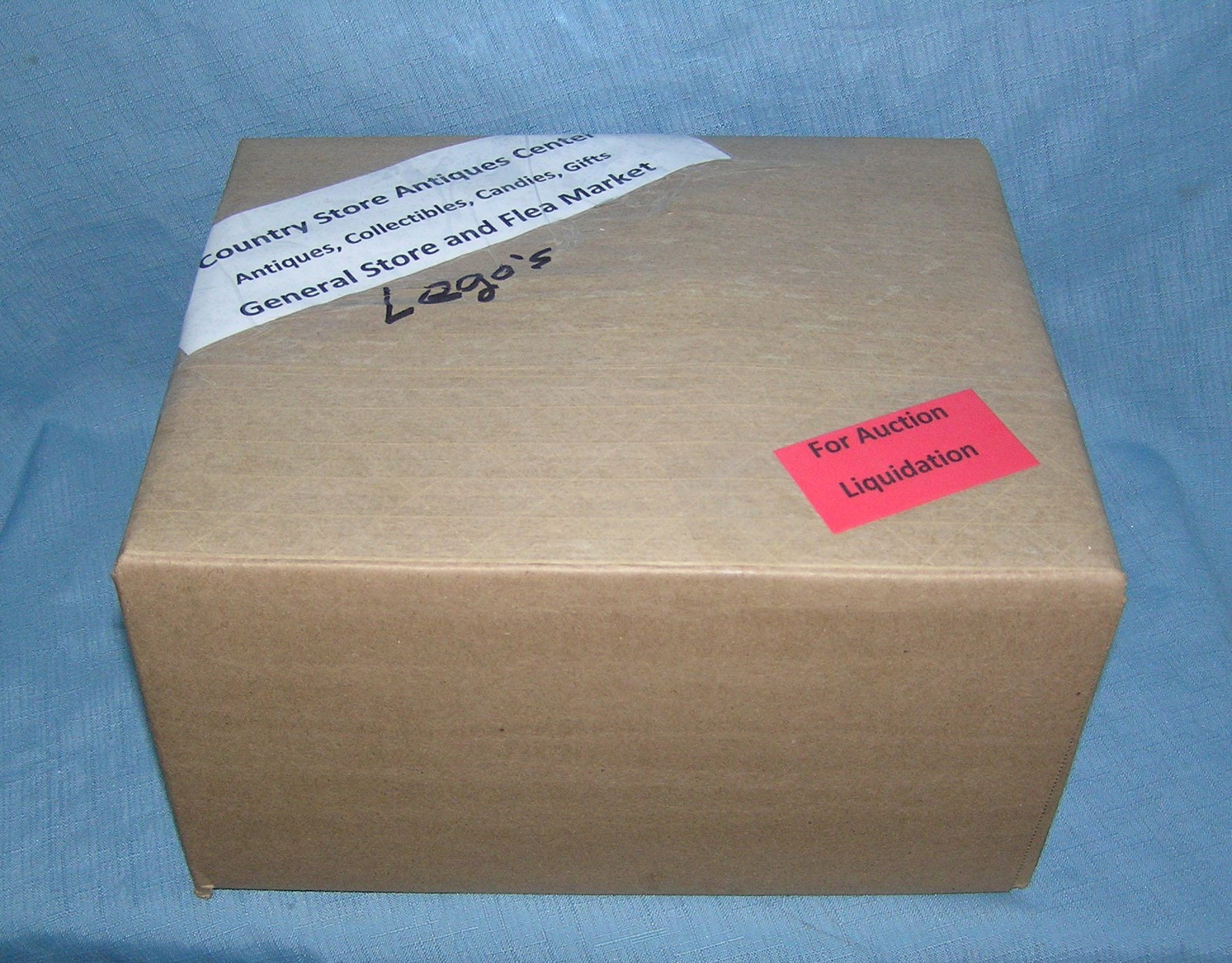 Moving and Storage Company mystery box lot: Moving and Storage Company mystery box lot marked The Country Store Antiques Center: Antiques, Collectibles, Candies, Gifts General Store and Flea Market, contents Lego's part of a moving and storage 