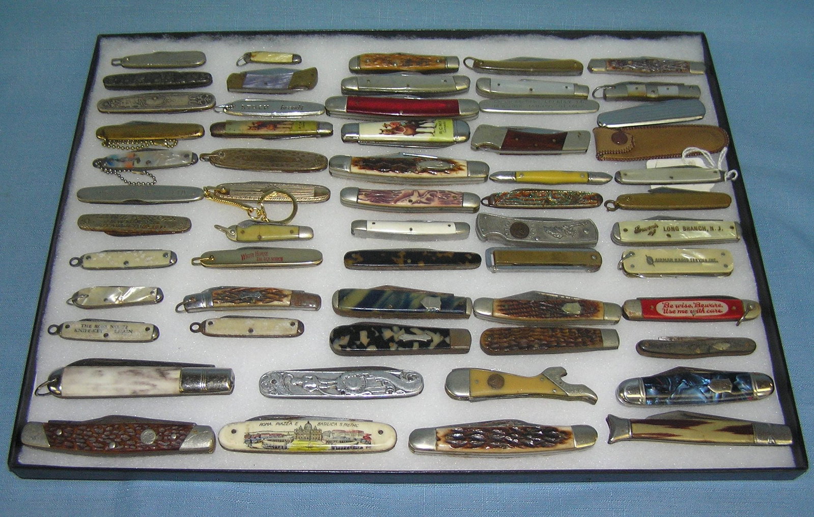 Antique pocket knife collection: 57 piece antique pocket knife collection includes advertising, figural, brass, bone, mother of pearl, gold plated, sterling and silver plated and much more many great manufacturers are represented her