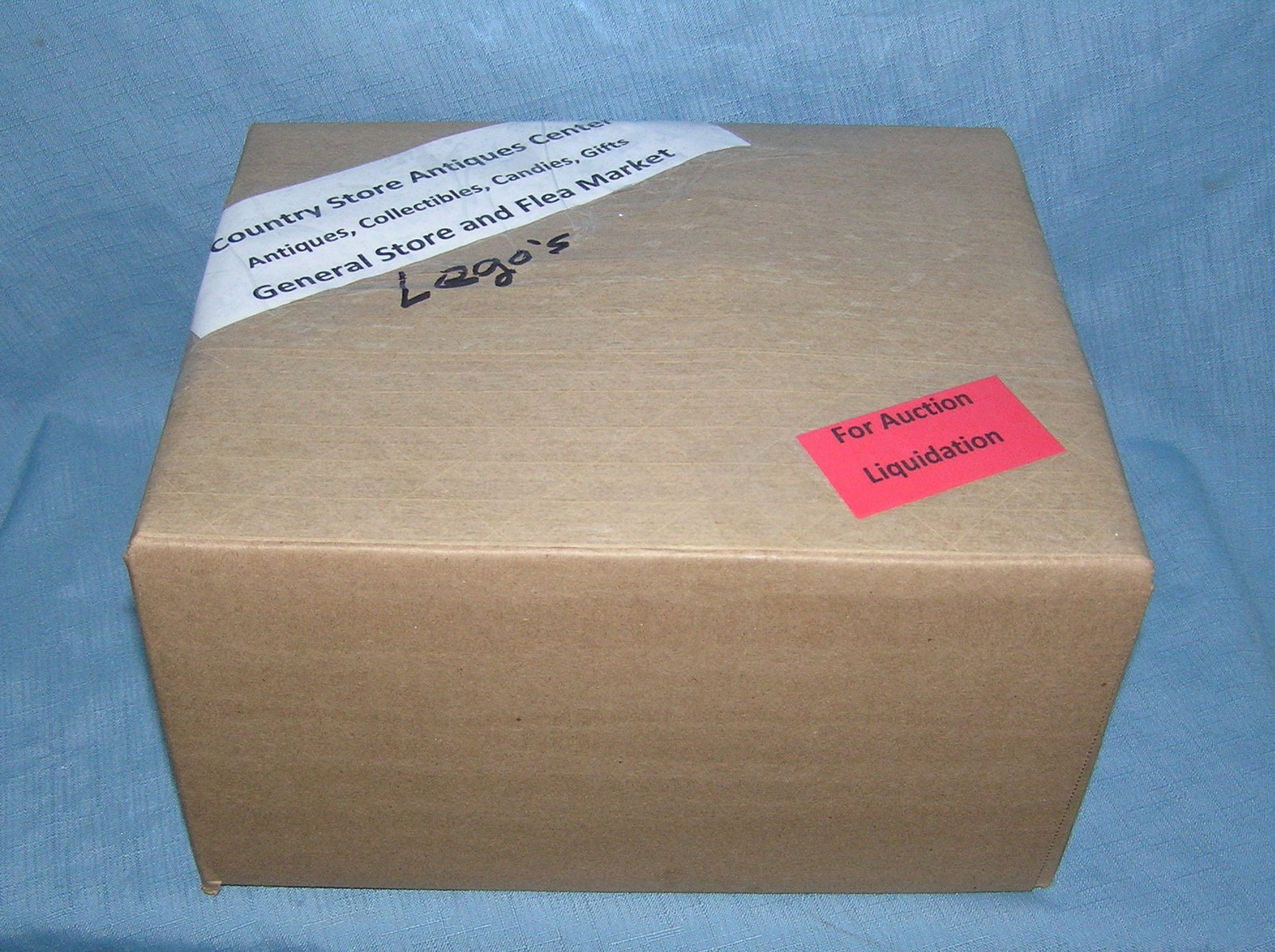 Moving and Storage Company mystery box lot: Moving and Storage Company mystery box lot marked The Country Store Antiques Center: Antiques, Collectibles, Candies, Gifts General Store and Flea Market, contents Lego's part of a moving and storage 