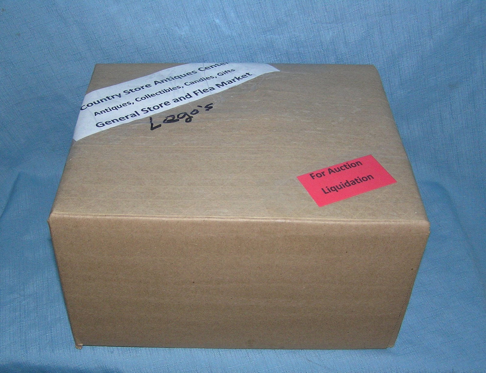 Moving and Storage Company mystery box lot: Moving and Storage Company mystery box lot marked The Country Store Antiques Center: Antiques, Collectibles, Candies, Gifts General Store and Flea Market, contents Lego's part of a moving and storage 