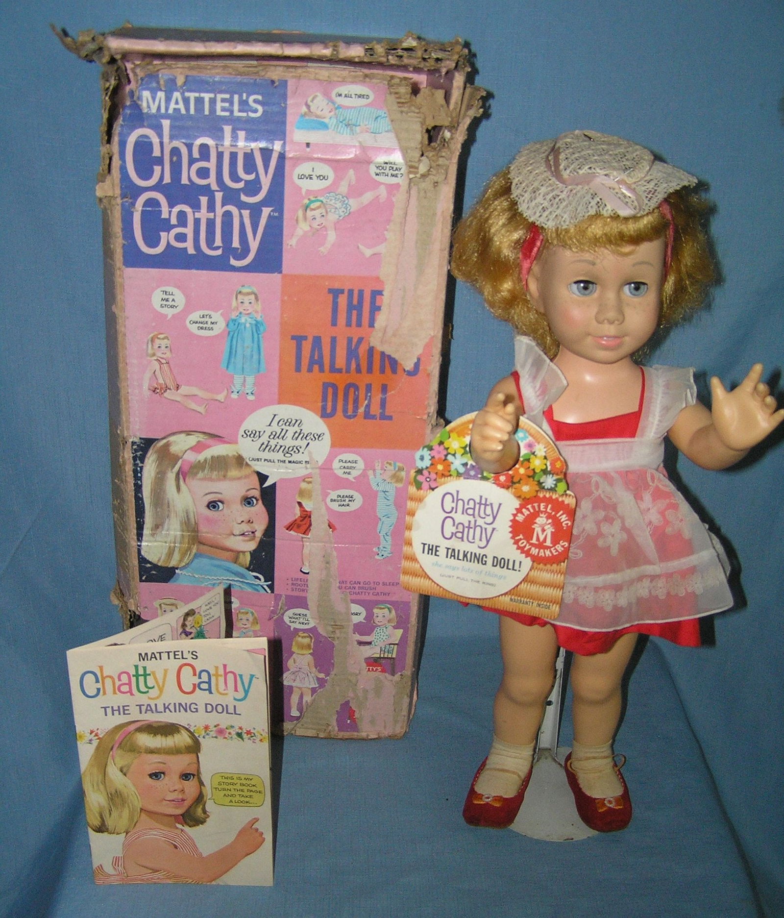 Vintage Chatty Cathy doll by Mattel Toys C.1959/1960: Vintage Chatty Cathy doll by Mattel Toys circa 1959/1960 20 inches tall with original box, tags and booklet. All original clothing and hat, talking mechanism complete but not working, doll is very goo