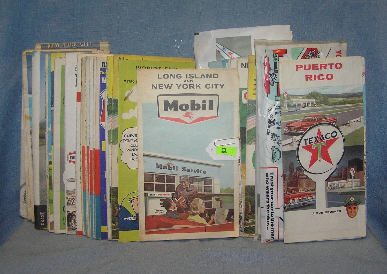 Collection of vintage auto related travel maps: Large collection of vintage auto related travel maps est. value $250.00-$300.00