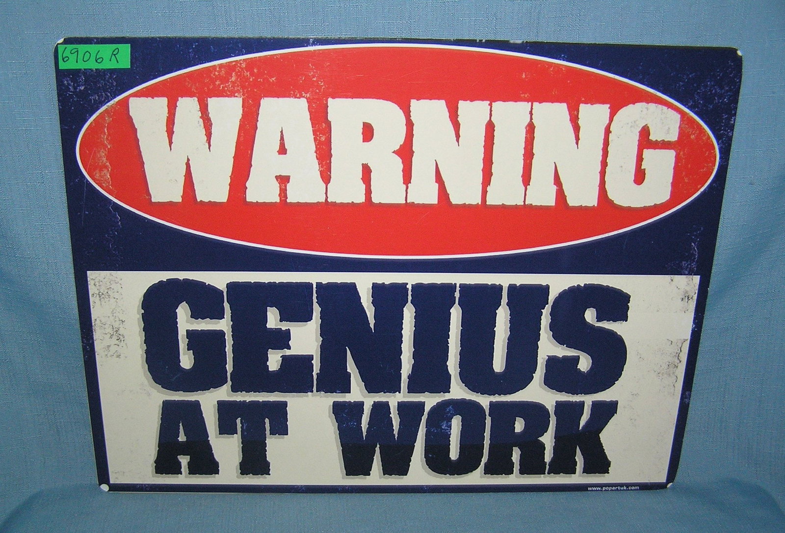 Warning: Genius at Work retro style advertising sign: Warning: Genius at Work retro style advertising sign printed on PVC hardboard these signs are auctioned for their decorative and display purposes 12 inches by 16 inches est. value $50.00-$60.00