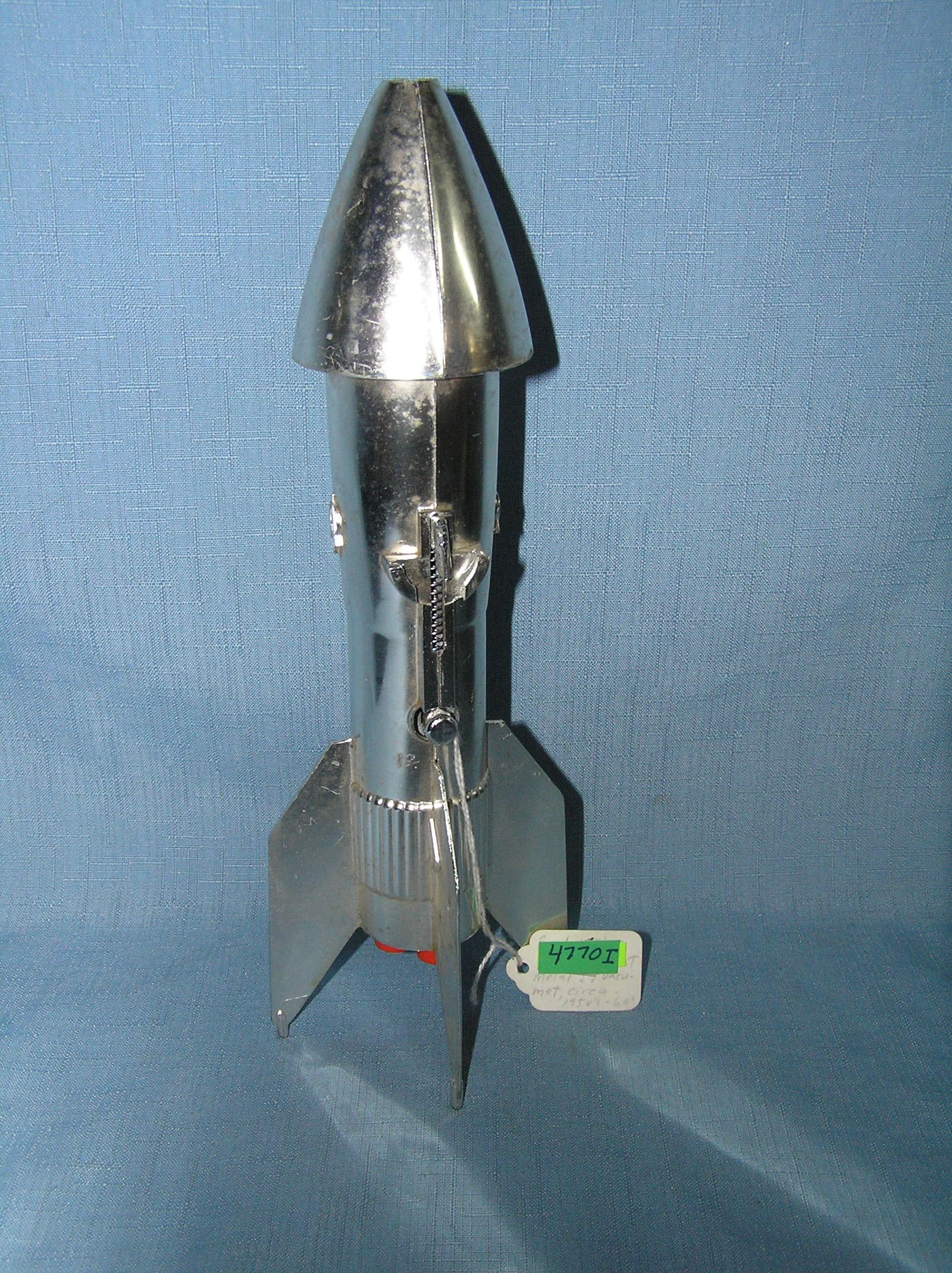 Rocket ship bank, painted version circa 1960s: Rocket ship bank, painted version circa 1960s est. value $250.00-$275.00