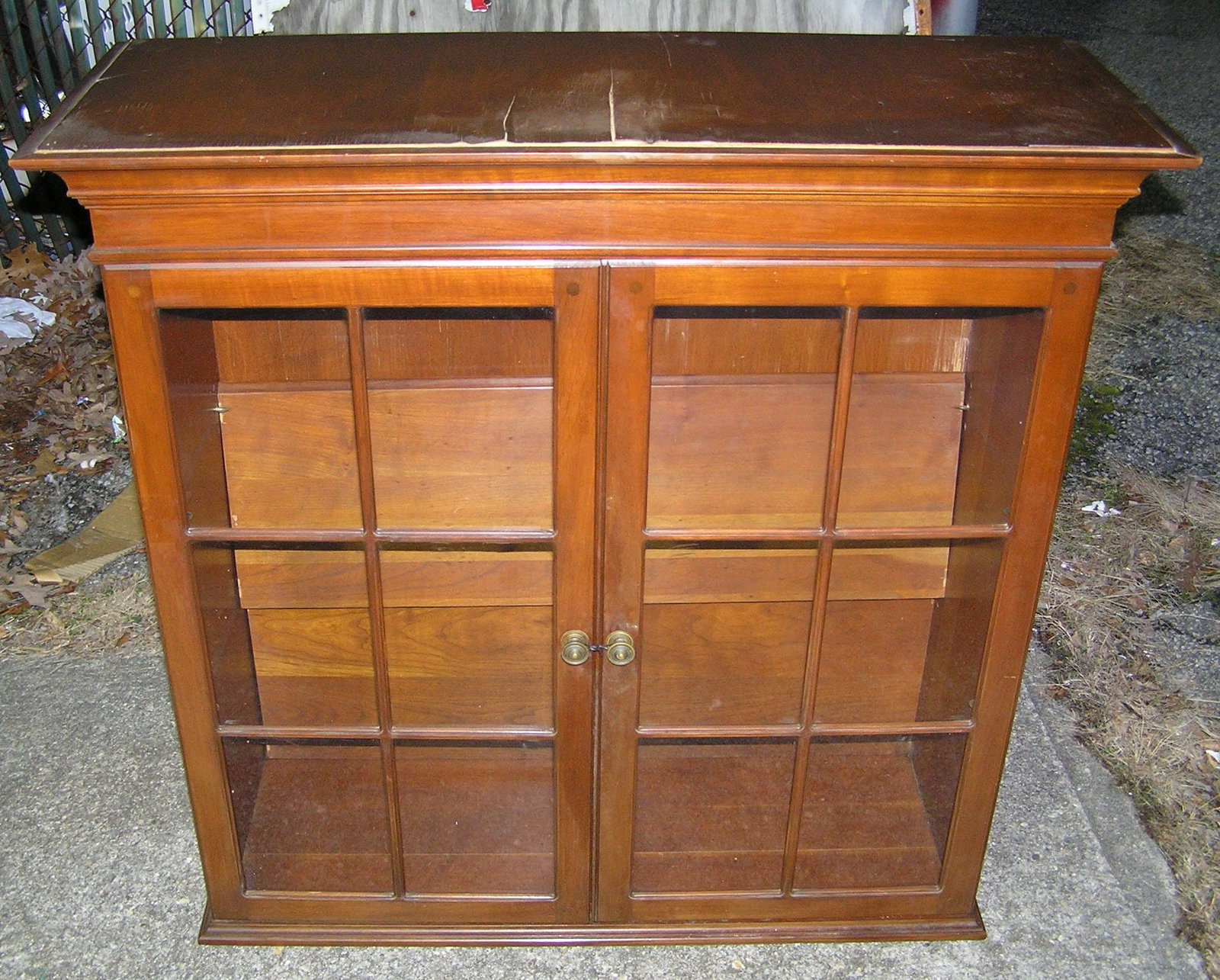 Walnut display cabinet with 2 shelves: Walnut display cabinet with 2 shelves circa 1950's 37 inches wide 14 inches deep 36 inches high customer to arrange pickup or delivery of this item est. value $300.00-$400.00