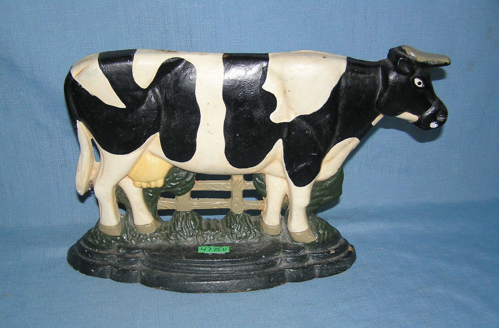 Large cast iron cow doorstop: Large cast iron cow doorstop est. value $150.00-$200.00