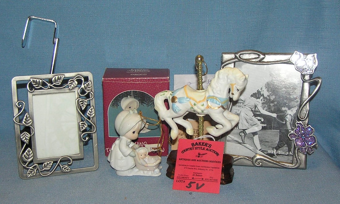 Group of misc. collectibles: Group of misc. collectibles includes a mini carousel horse, Precious Moments figure in original box, pair of miniature picture frames and a door hook est. value $25.00-$35.00