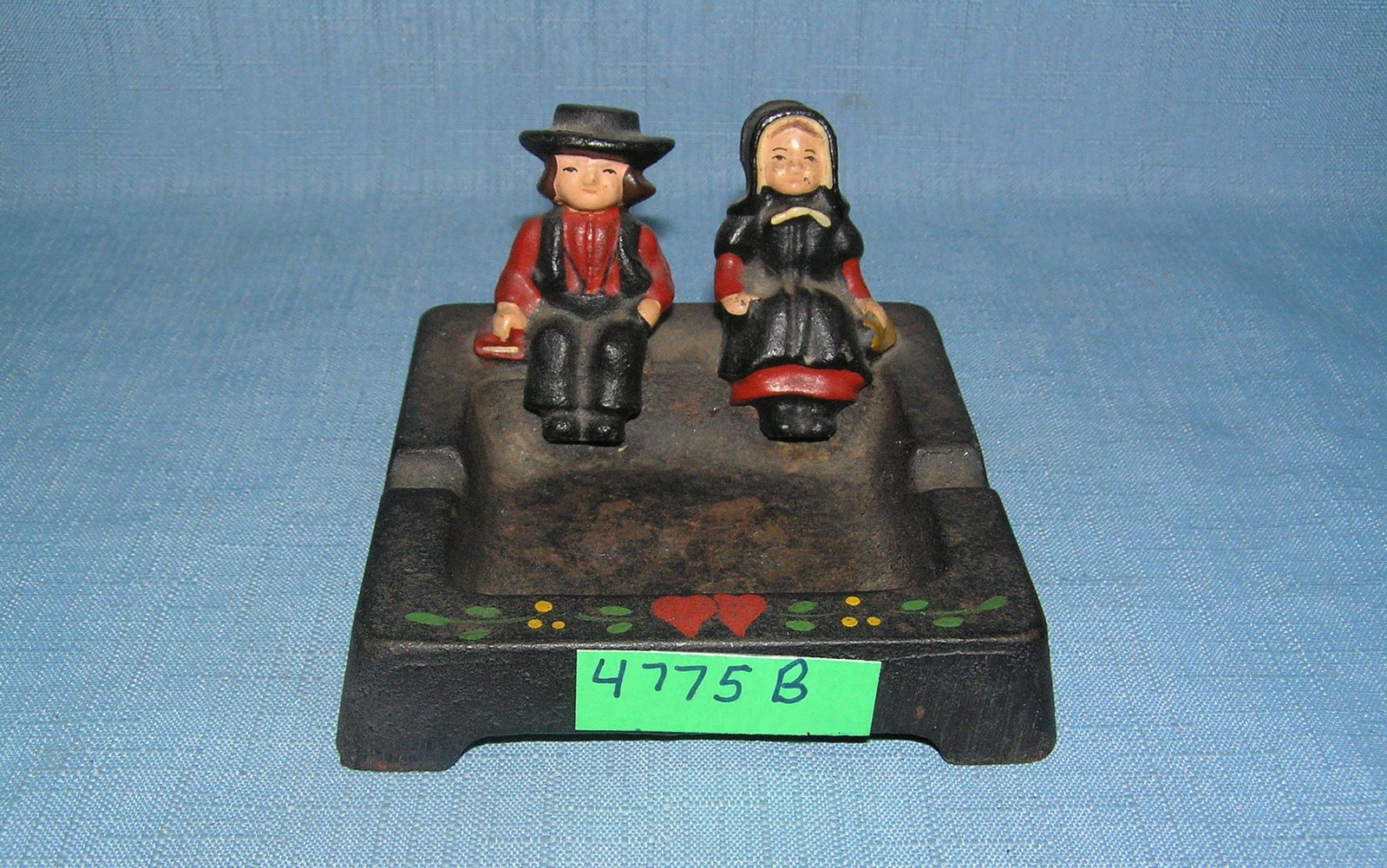 Cast iron Dutch couple ash tray: Cast iron Dutch couple ash tray Wilton Company circa 1960s est. value $50.00-$60.00