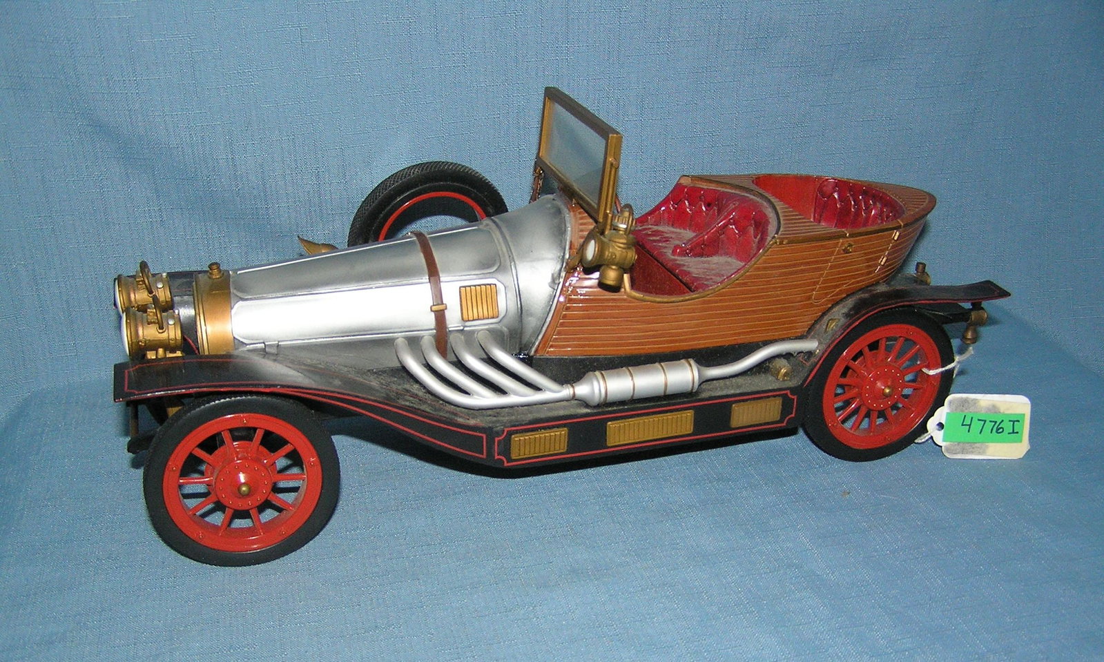 Antique style automobile open air touring car: Antique style automobile open air touring car est. value $50.00-$75.00