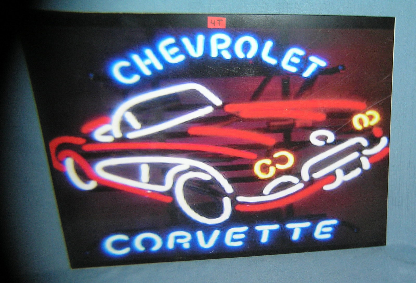 Chevy Corvette retro style advertising sign: Chevy Corvette retro style advertising sign printed on PVC hard board these signs are auctioned for there decorative and display purposes 12 inches by 16 inches est. value $50.00-$60.00