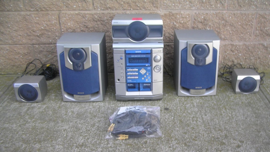 Complete Aiwa stereo system with surround sound: Complete Aiwa stereo system with surround sound, 6pieces plus est. value $ 125.00-$150.00