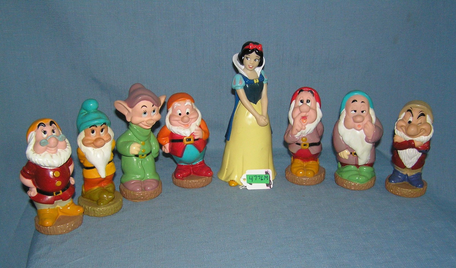 Painted plastic Snow White and the 7 dwarfs Disney figure set: Painted plastic Snow White and the 7 dwarfs Disney figure set, Snow White is also a bank est. value $200.00-$225.00