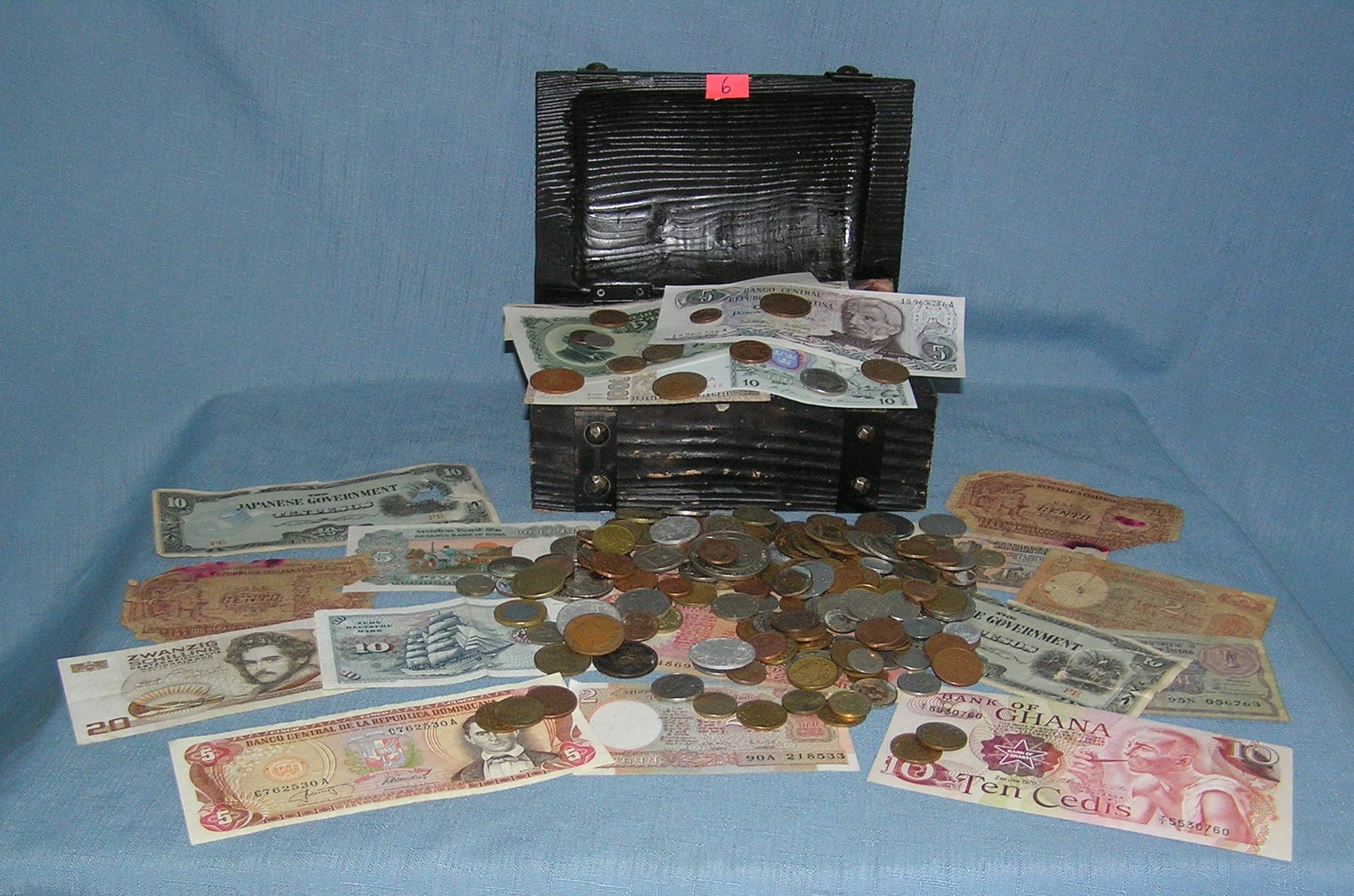 Estate collection of world coins and currency: Estate collection of world coins and currency over 200 pieces est. value $200.00-$225.00