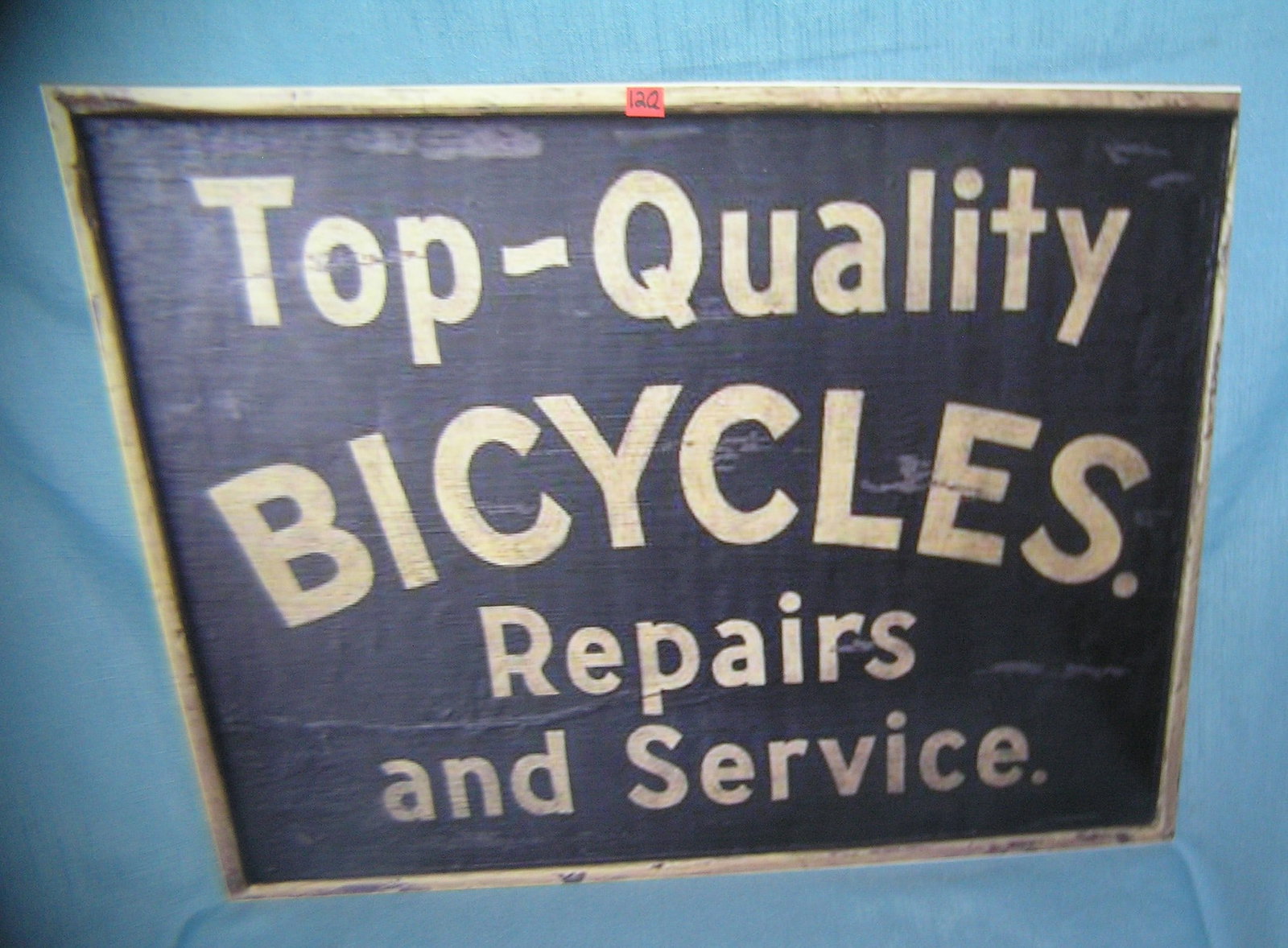 Large retro style quality bicycle repairs & service sign: Large retro style quality bicycle repairs and service advertising sign large 18 inches by 24 inches advertising sign printed on masonite hard board est. value $200.00-$250.00