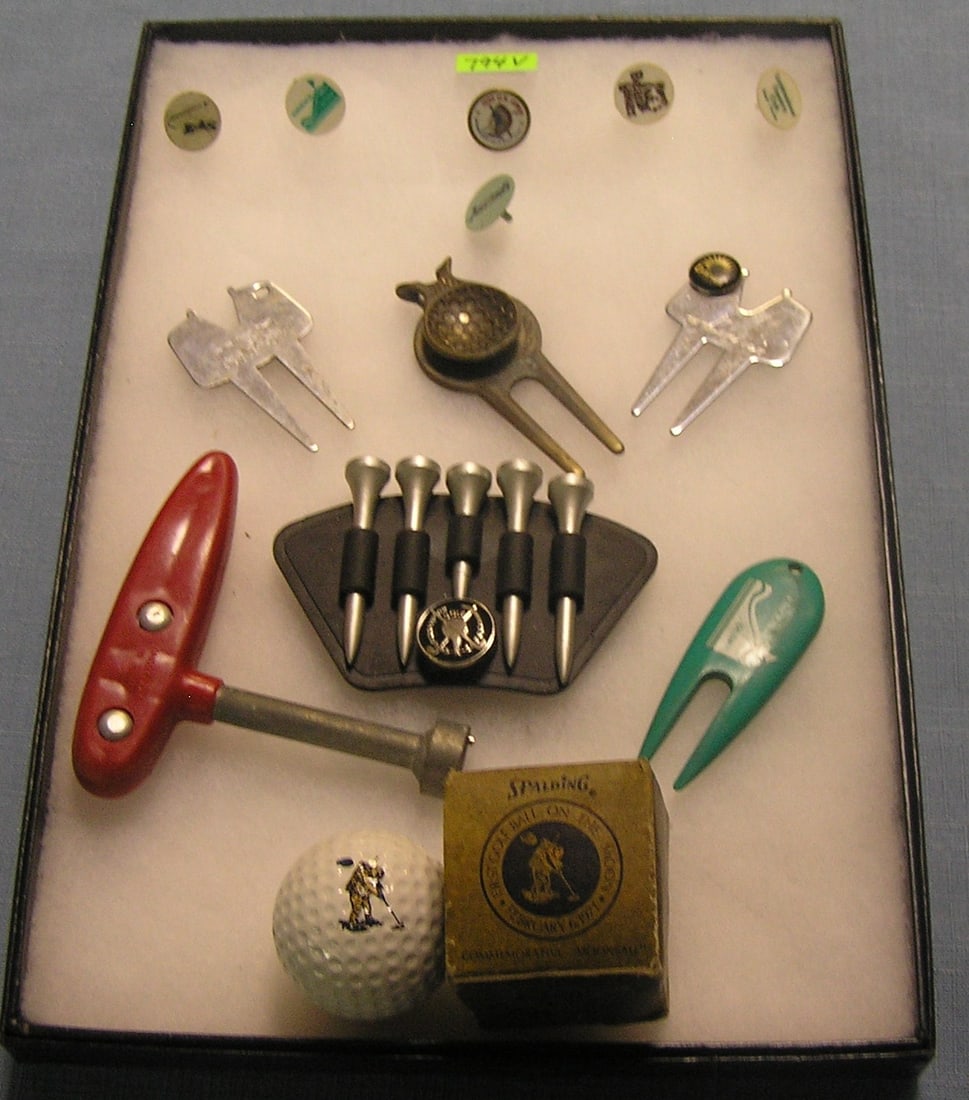 Group of vintage golf collectibles: Group of vintage golf collectibles includes commemorative first golf ball on the moon by Spalding and 95 US open at Shinnecock ball marker and more est. value $100.00-$125.00
