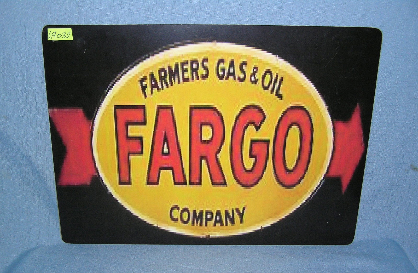 Farmer's gas and oil company, Fargo retro style advertising sign: Farmer's gas and oil company, Fargo retro style advertising sign printed on PVC hardboard these signs are auctioned for their decorative and display purposes 12 inches by 16 inches est. value $50.00-$