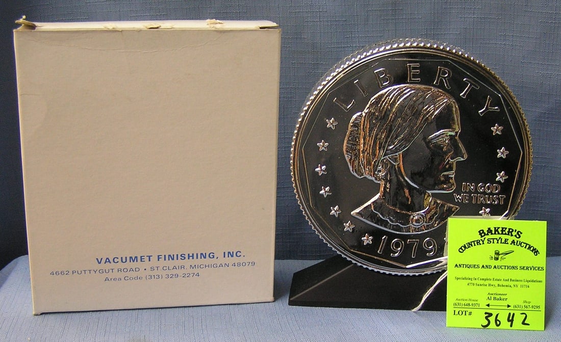 Vintage cast metal Susan B. Anthony coin bank: Vintage cast metal Susan B. Anthony coin bank in original box est. value $75.00-$95.00