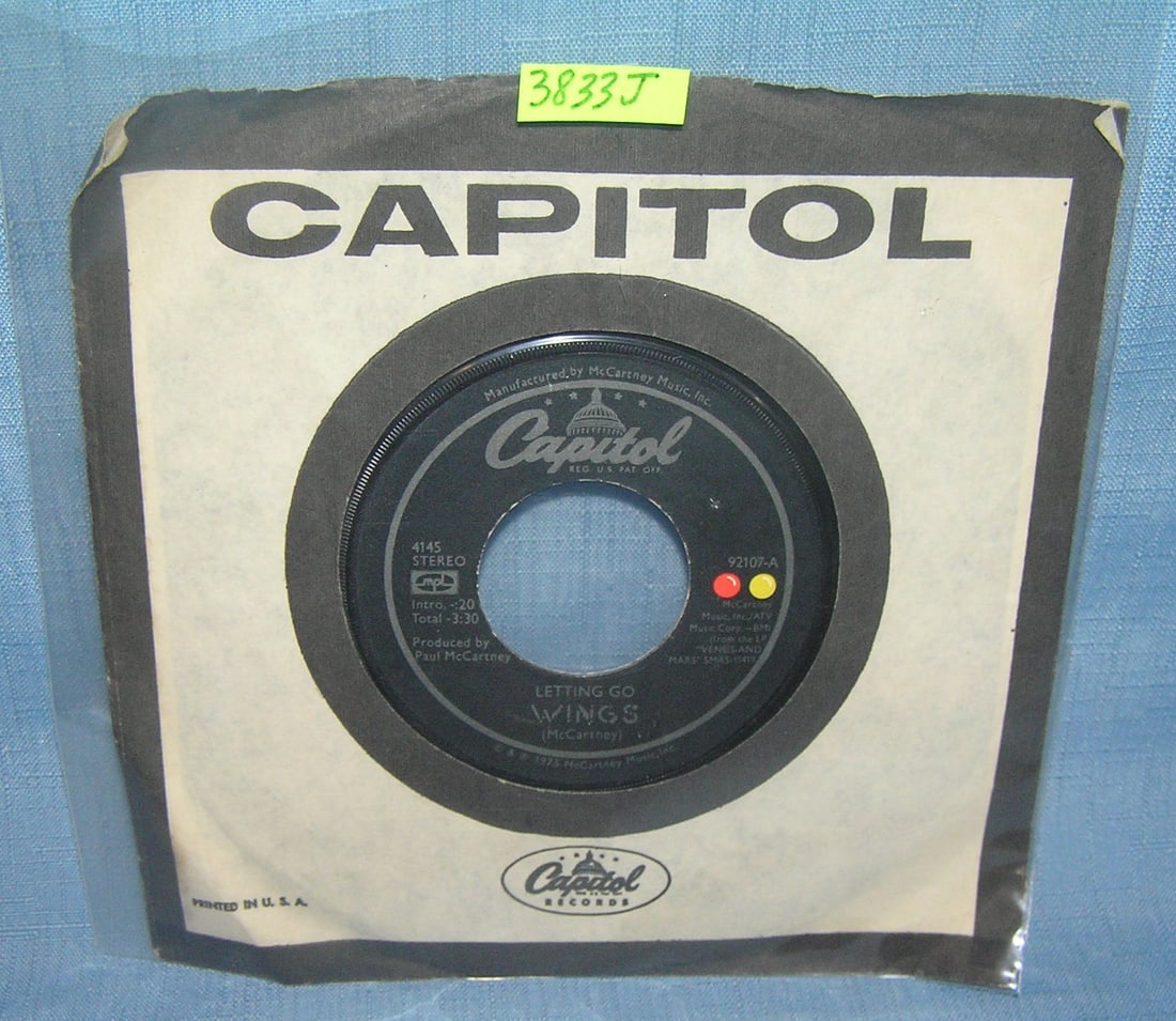 Wings with Paul McCartney 45 RPM record: Wings with Paul McCartney vintage 45 RPM record on Capitol featuring Letting Go and You Gave Me the Answer est. value $15.00-$20.00
