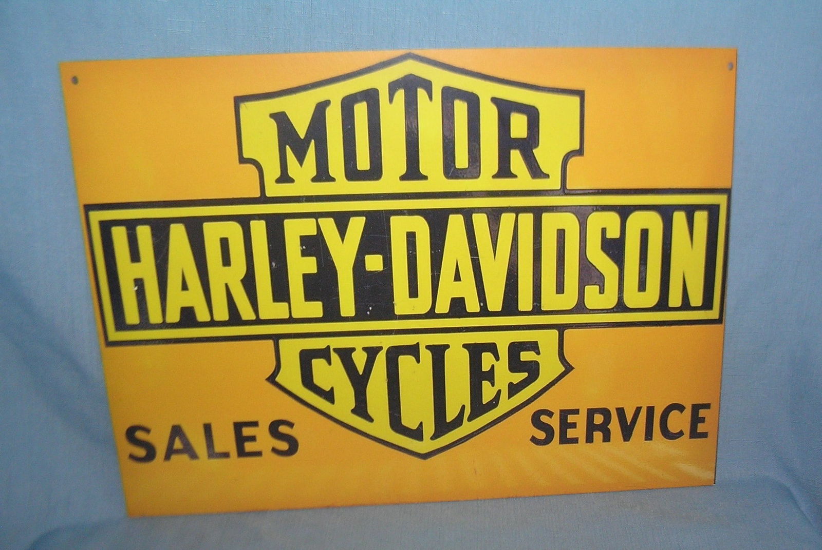 Harley Davidson Motorcycles retro style sign: Harley Davidson Motorcycles sales and service retro style advertising sign printed on PVC hard board these signs are auctioned for there decorative and display purposes 12 by 16 est. value $50.00-$60.