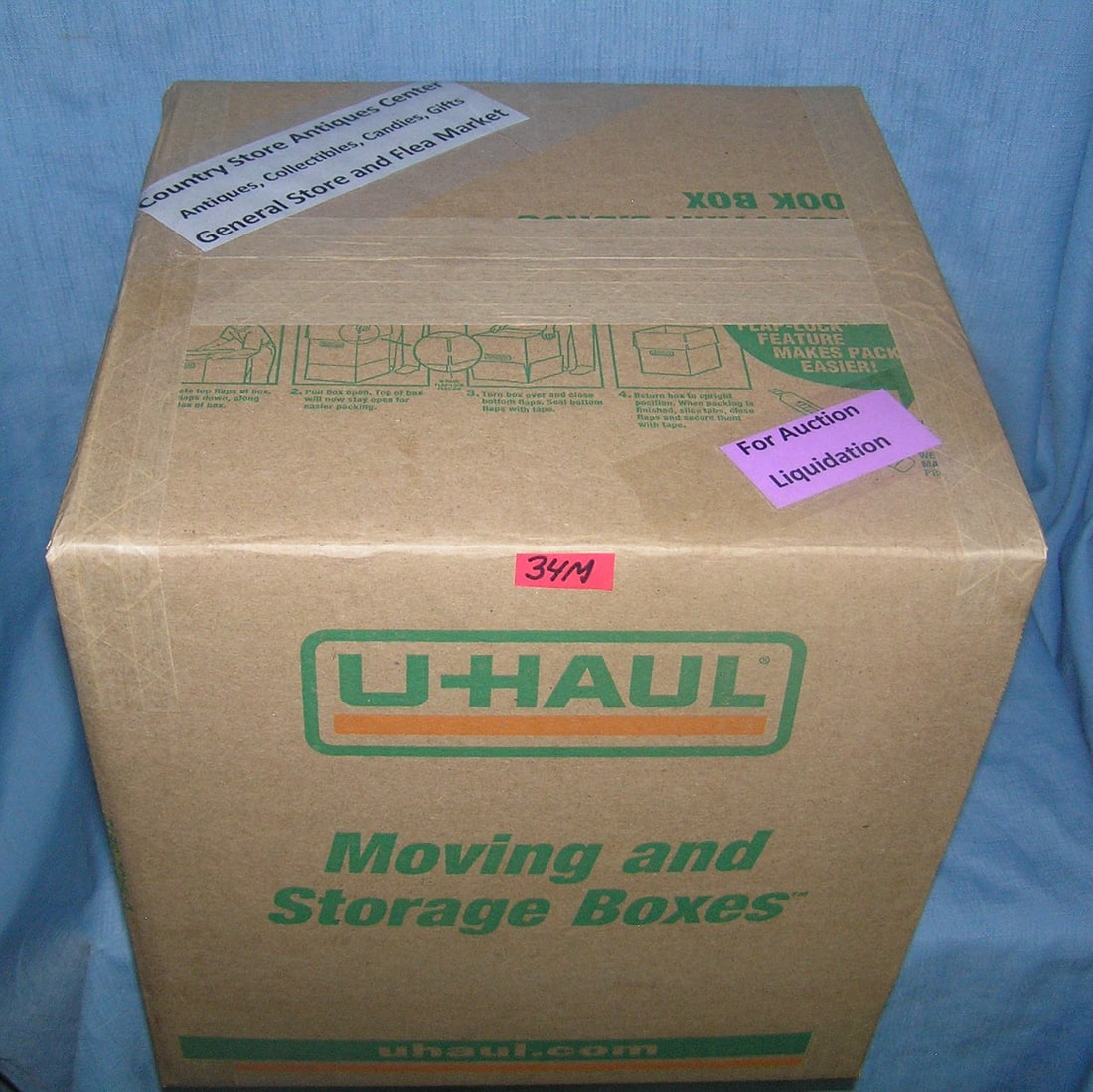 Moving and Storage Company mystery box lot: Moving and Storage Company mystery box lot marked The Country Store Antiques Center: Antiques, Collectibles, Candies, Gifts, General Store and Flea Market part of a moving and storage company seized o
