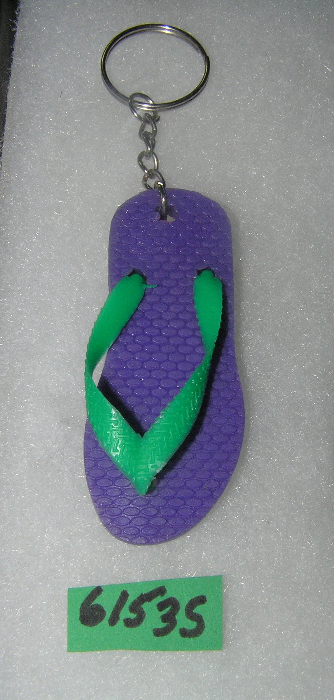 Flip flop novelty key chain: Flip flop novelty key chain est. value $25.00-$30.00