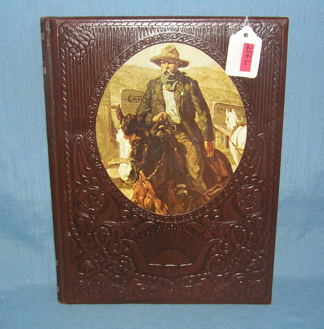 Gun Fighters of the Old West a great hard cover book: "Gun Fighters of the Old West" a great leather bound hard cover book loaded with photos est. value $50.00-$75.00