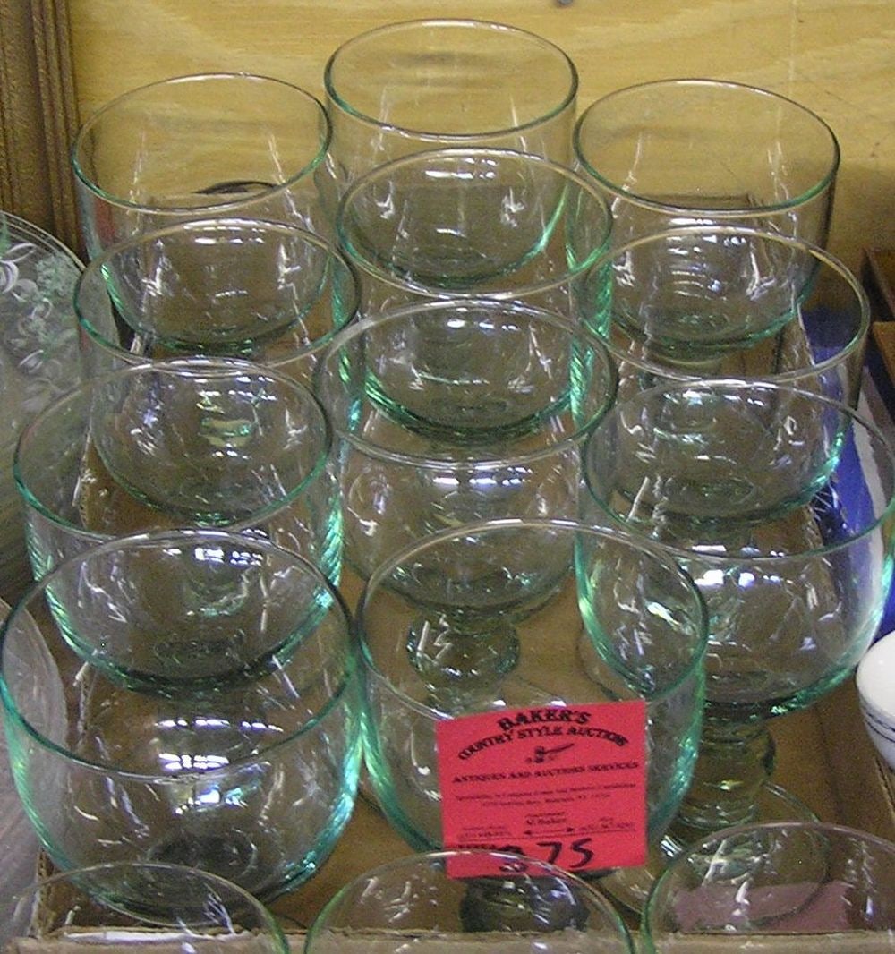 Set of green art glass drink glasses: Set of 11 green art glass drink glasses est. value $40.00-$50.00