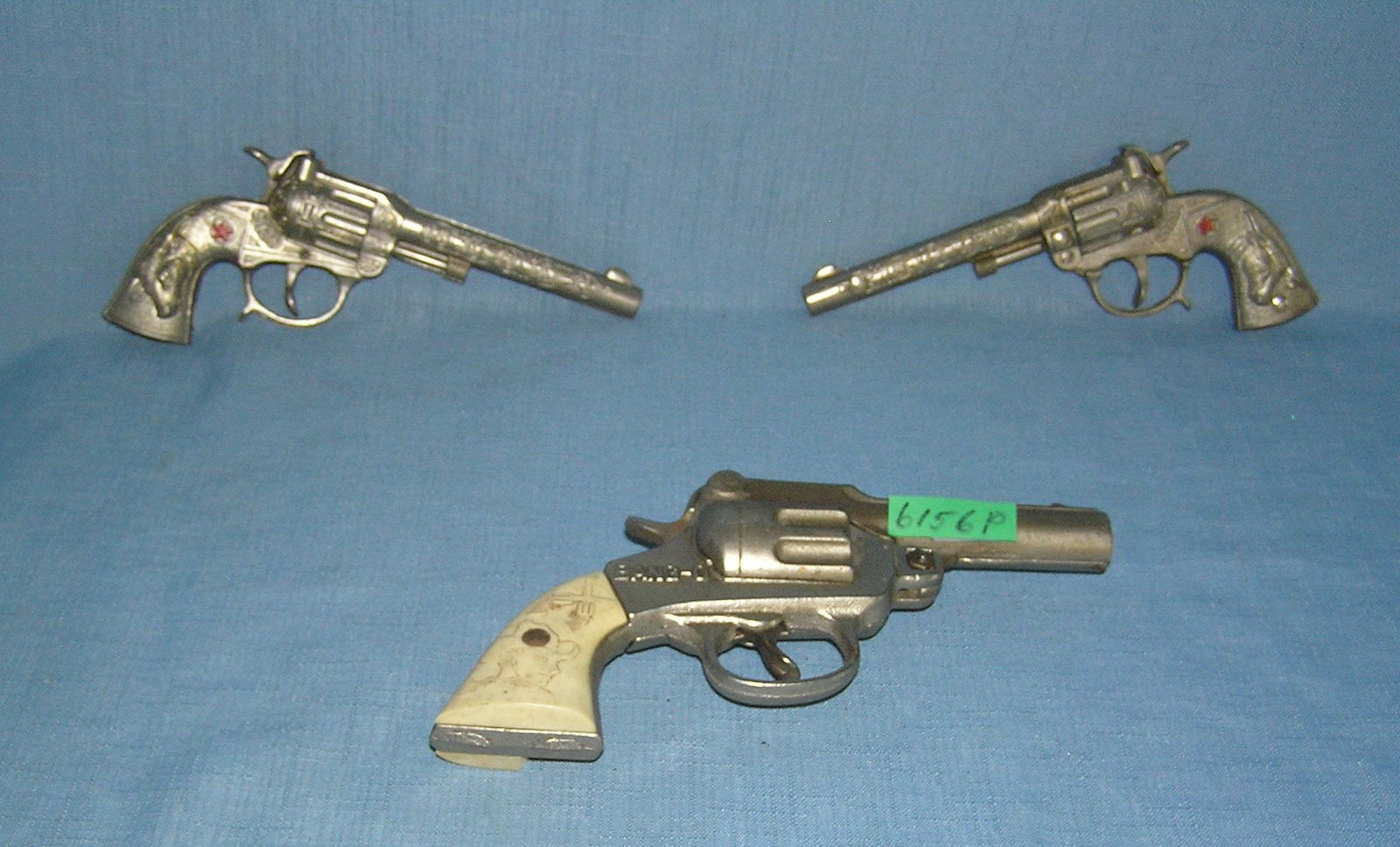 Group of vintage western themed cap guns: Group of vintage western themed cap guns condition as found est. value $200.00-$250.00