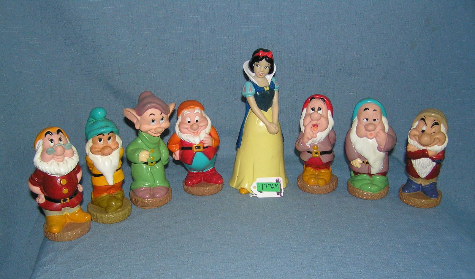 Painted plastic Snow White and the 7 dwarfs Disney figure set: Painted plastic Snow White and the 7 dwarfs Disney figure set, Snow White is also a bank est. value $200.00-$225.00