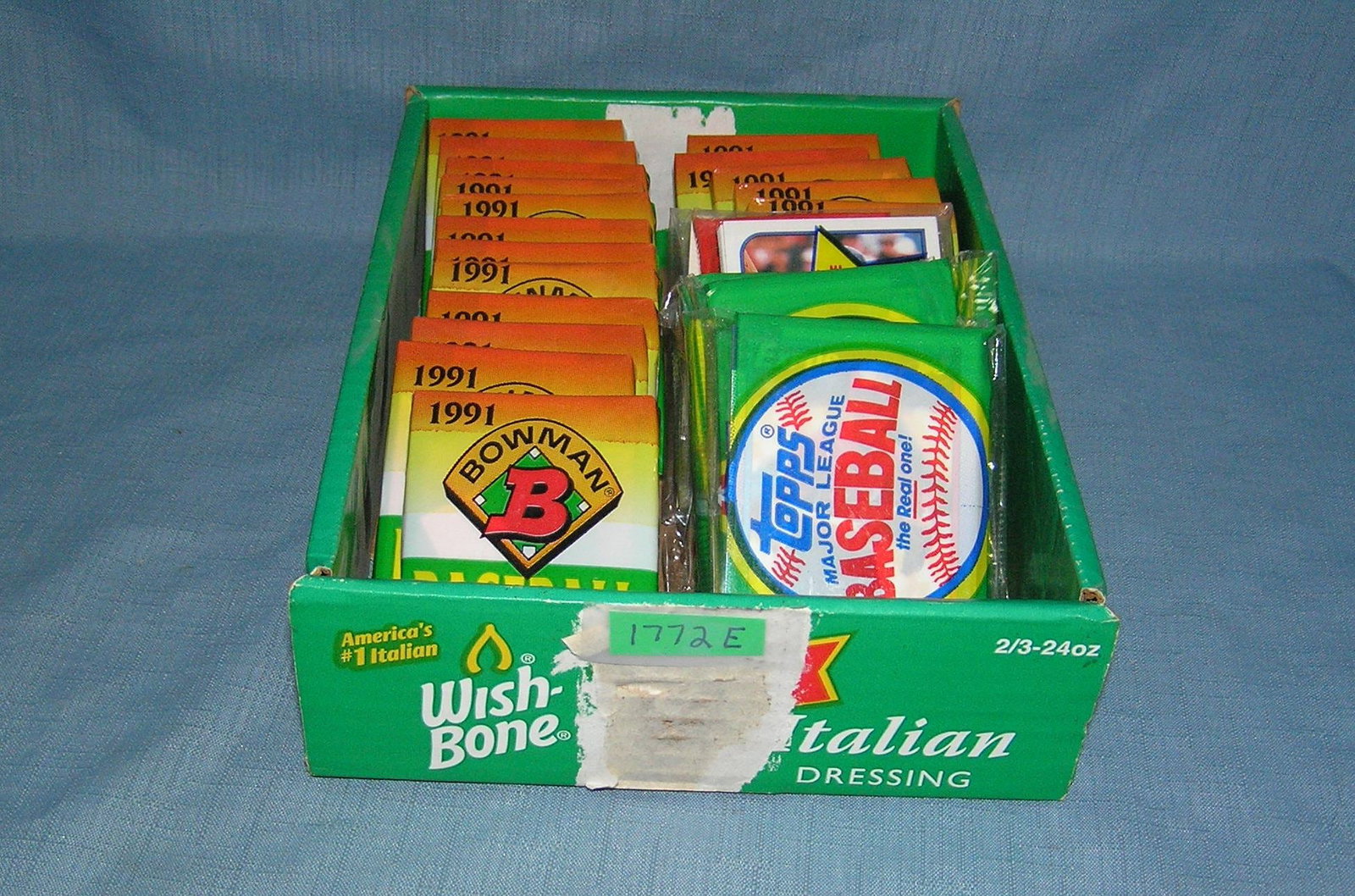 Box of unopened Topps and Bowman baseball card packs: Box of unopened Topps and Bowman baseball card packs est. value $200.00-$250.00