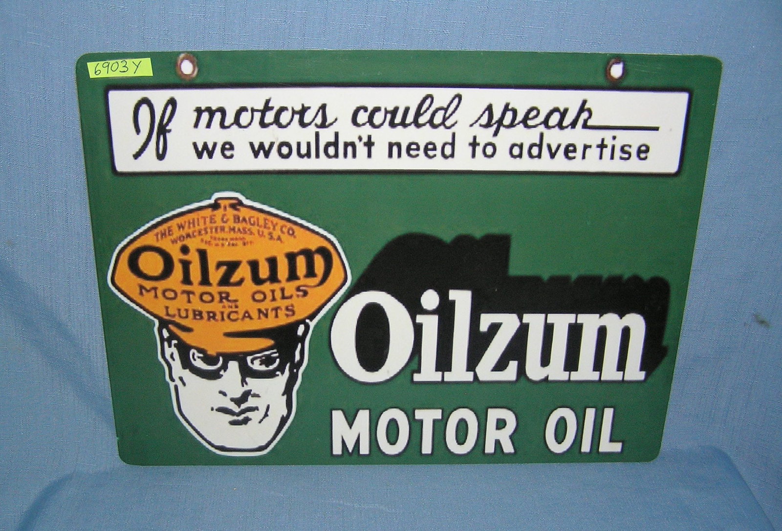 Oilzum motor oil retro style advertising sign: Oilzum motor oil retro style advertising sign printed on PVC hardboard these signs are auctioned for their decorative and display purposes 12 inches by 16 inches est. value $50.00-$60.00
