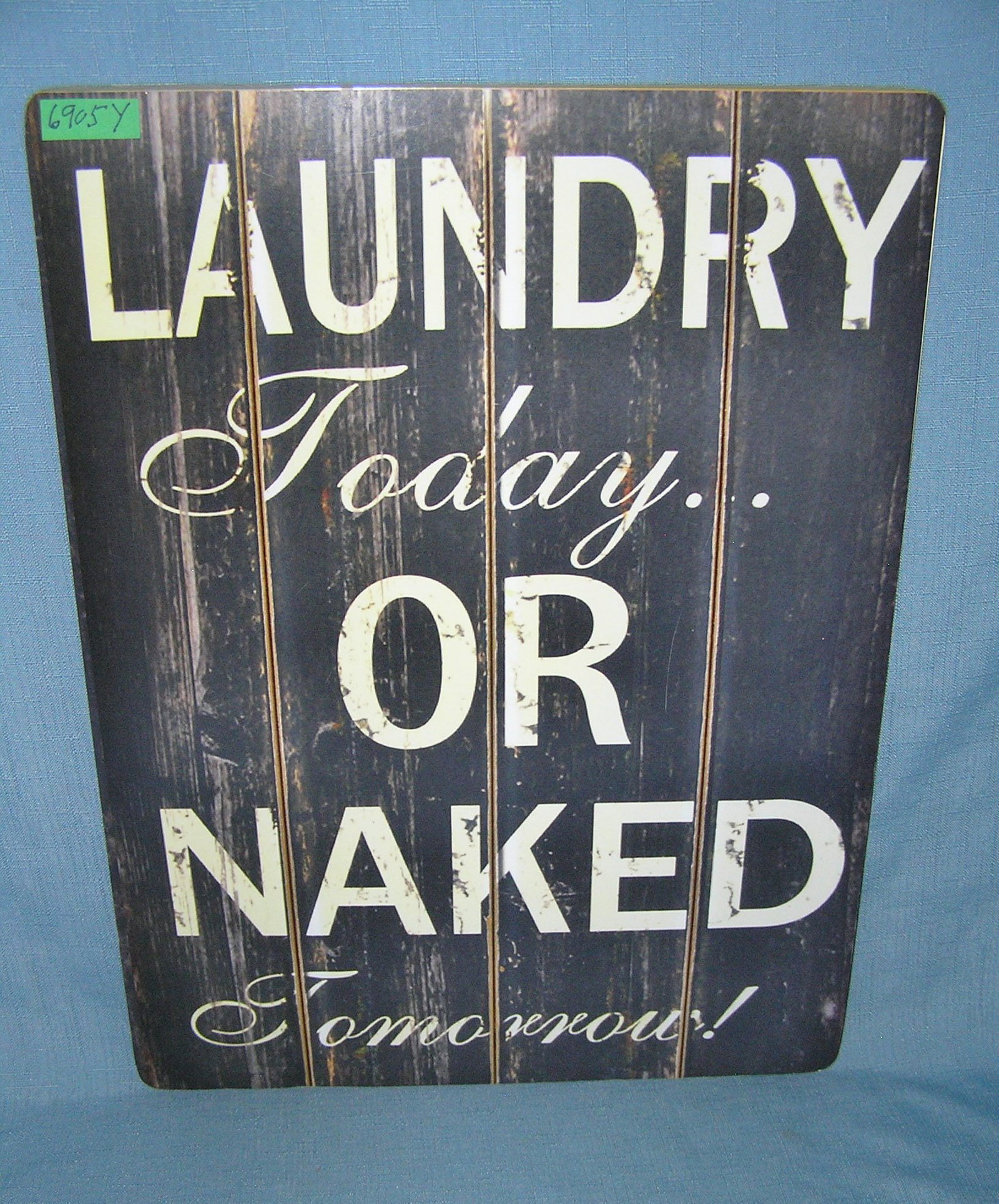 Laundry today or naked tomorrow retro style advertising sign: Laundry today or naked tomorrow retro style advertising sign printed on PVC hardboard these signs are auctioned for their decorative and display purposes 12 inches by 16 inches est. value $50.00-$60.0