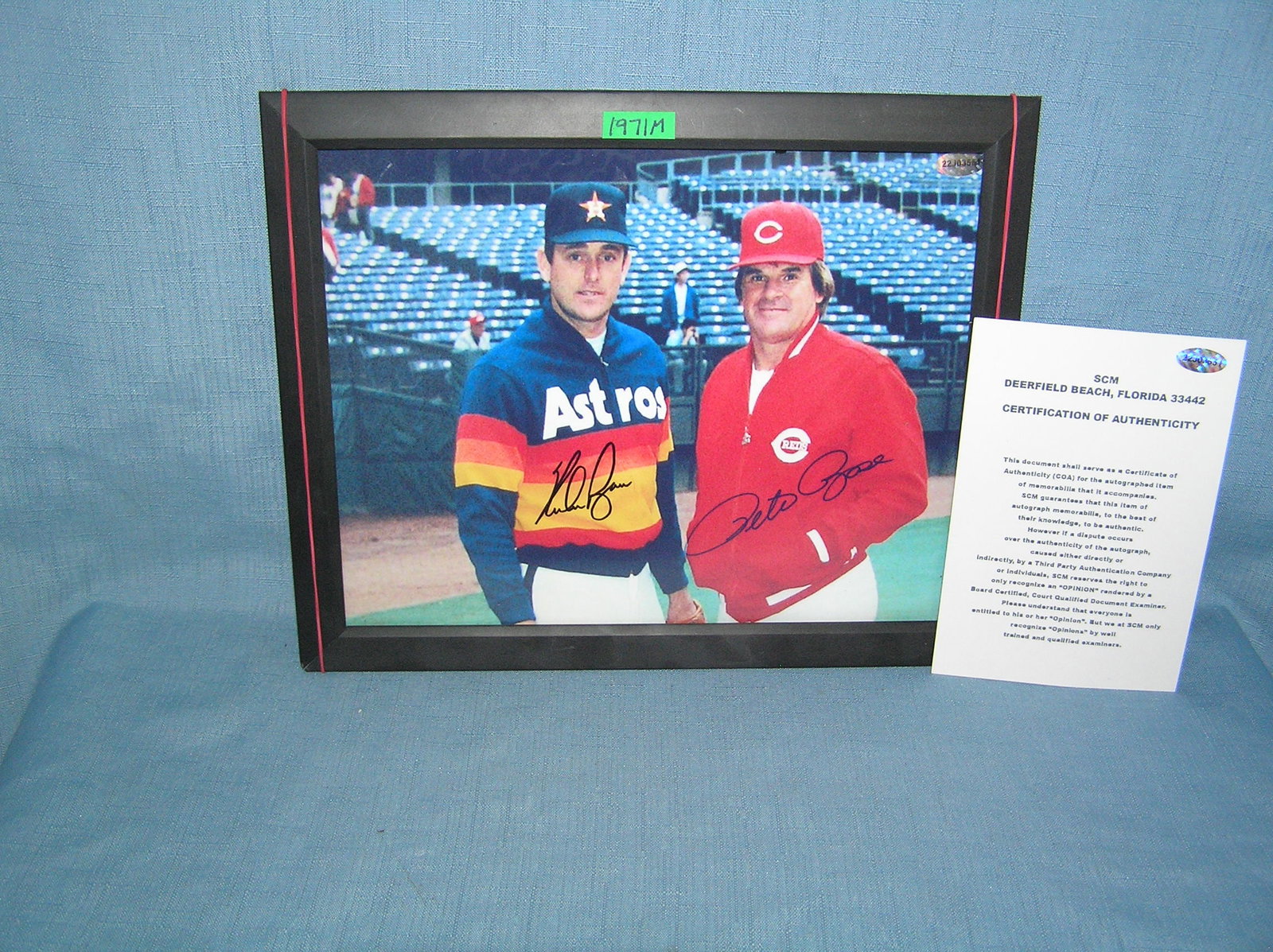 Autographed Pete Rose and Nolan Ryan 8 by 10 color photo: Autographed Pete Rose and Nolan Ryan 8 by 10 color photo with certificae of authenticity, framed, frame is in condition as found est. value $200.00-$300.00