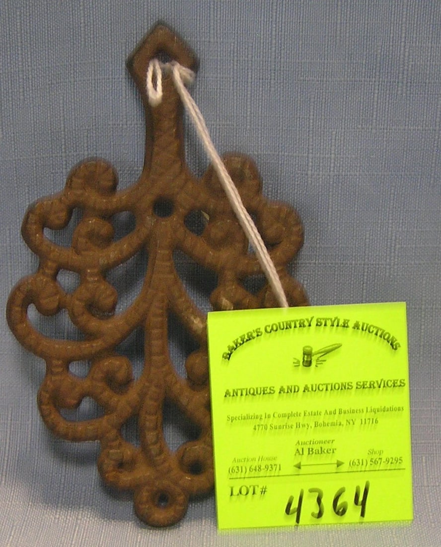 Antique cast iron trivet: Antique cast iron trivet est. value $25.00-$35.00