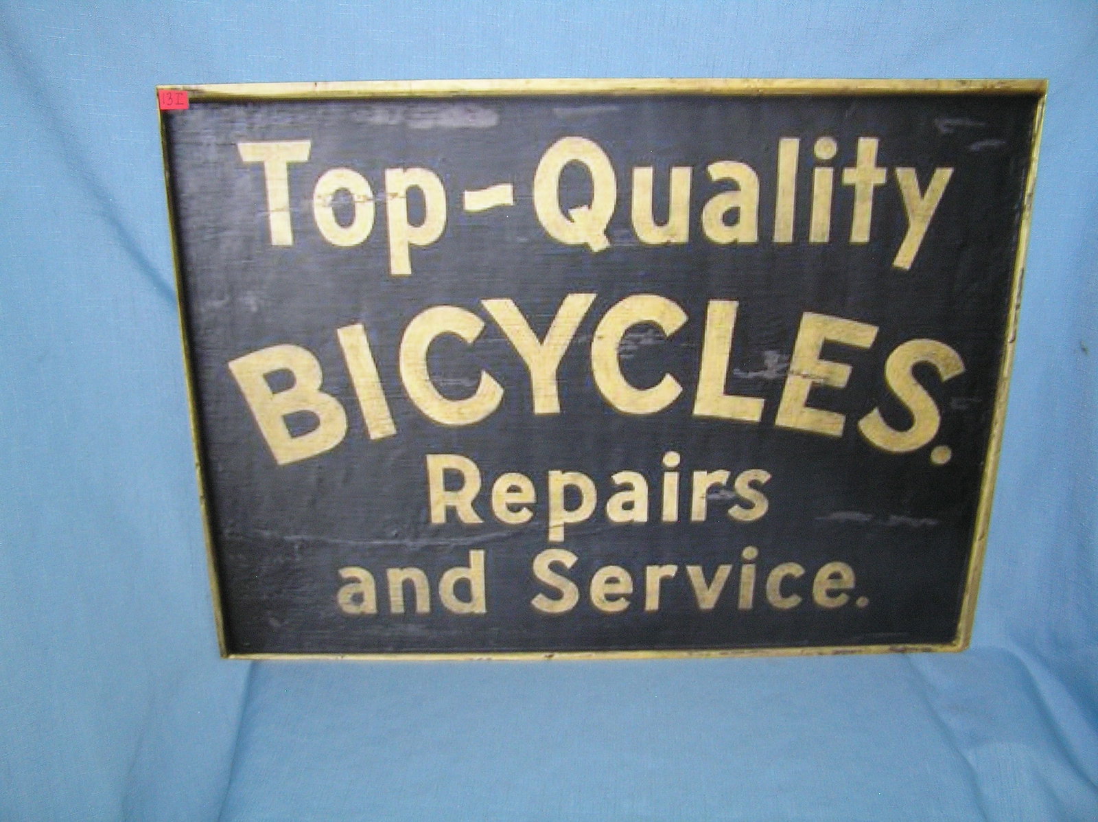 Top quality bicycles repairs and service retro style advertising sign: Top quality bicycles repairs and service retro style advertising sign large 20 inches by 30 inches printed on masonite board est. value $200.00-$225.00