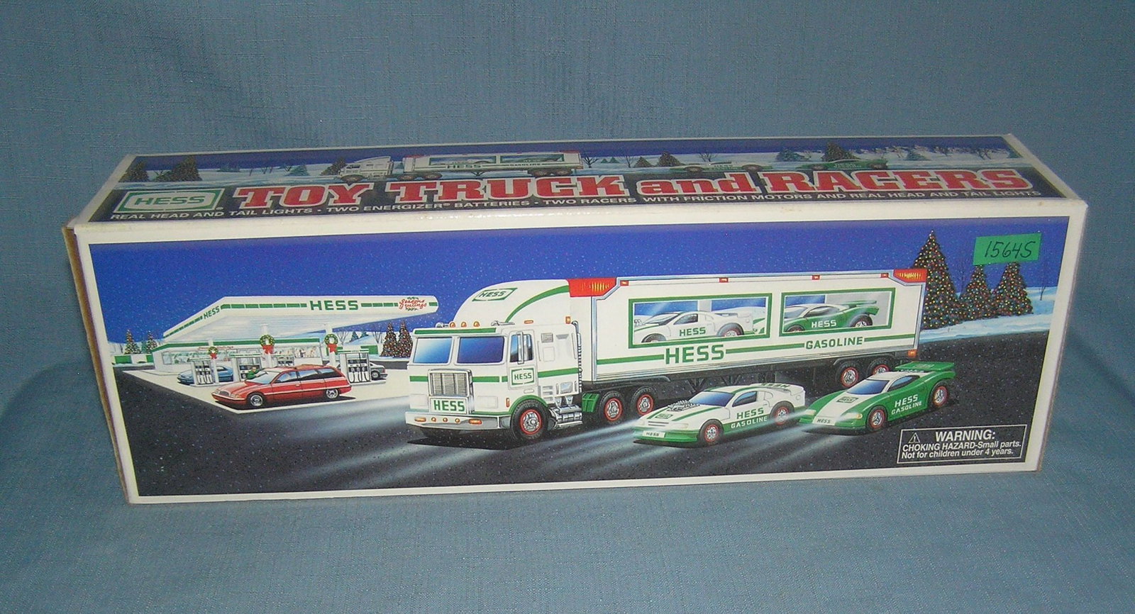 Hess toy truck and race cars with original box: Hess toy truck and race cars with original box est. value $50.00-$60.00