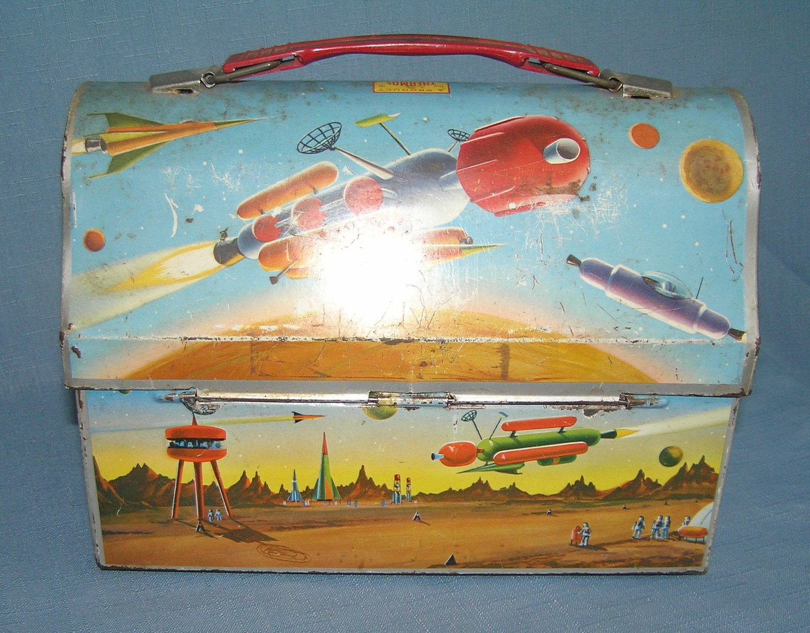 Early space themed domed shaped lunch box: Early space themed domed shaped lunch box by Thermos est. value $100.00-$125.00
