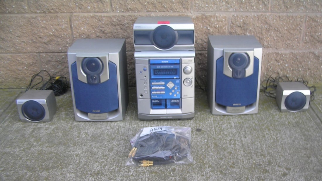 Complete Aiwa stereo system with surround sound: Complete Aiwa stereo system with surround sound, 6pieces plus est. value $ 125.00-$150.00